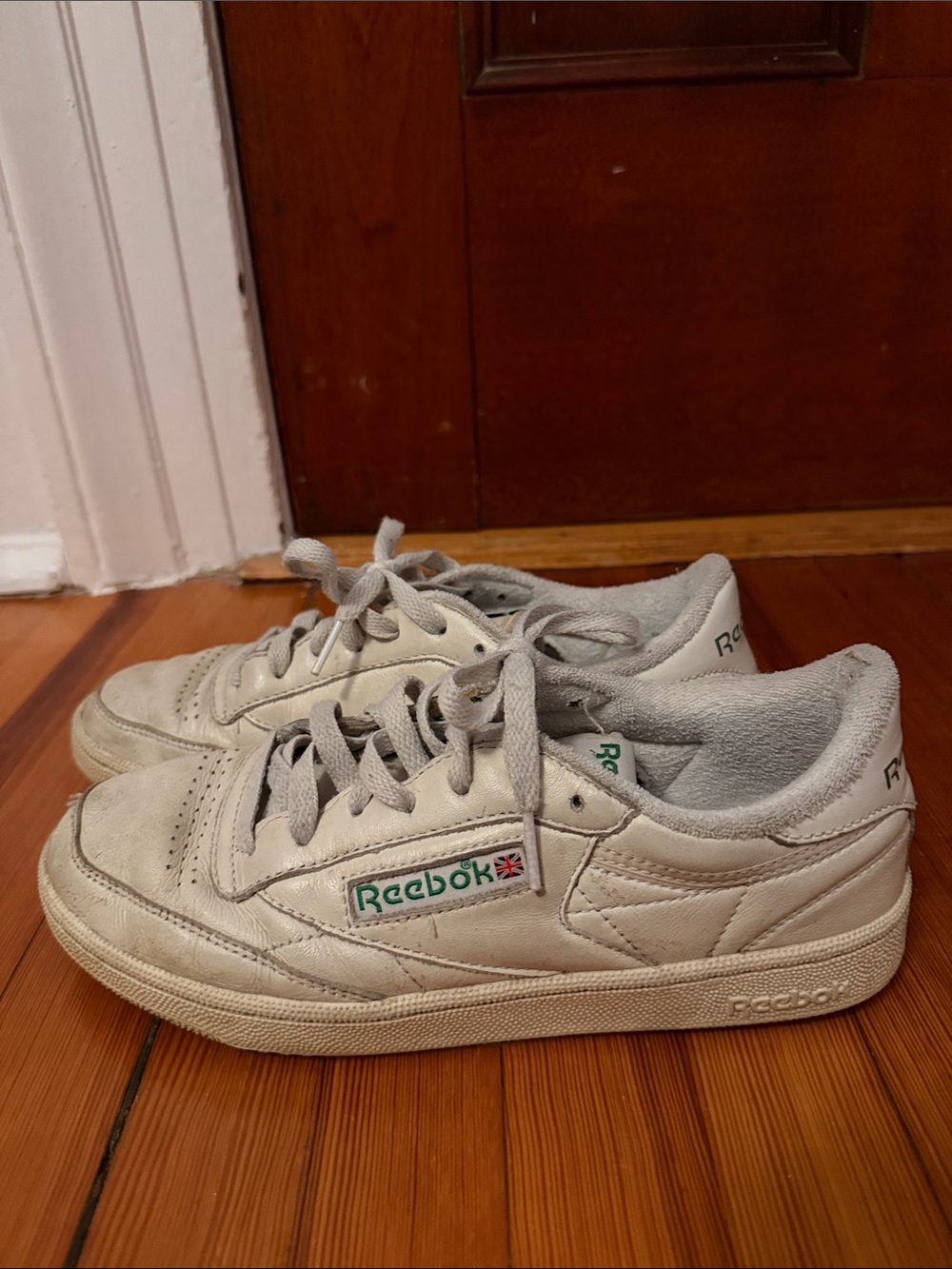 Reebok White Low-Top Leather Sneakers with Green Logo